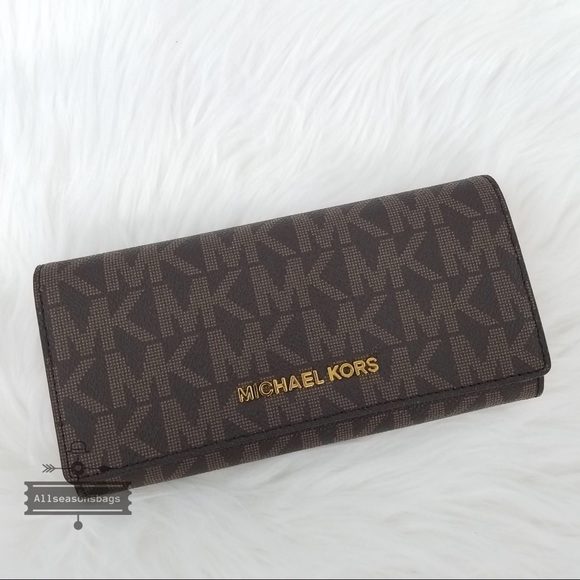 Michael Kors Handbags - Michael Kors Jet set travel carryall brown wallet